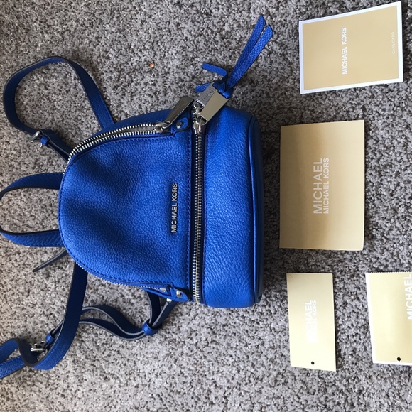 Brand New Michael Kors mini blue backpack